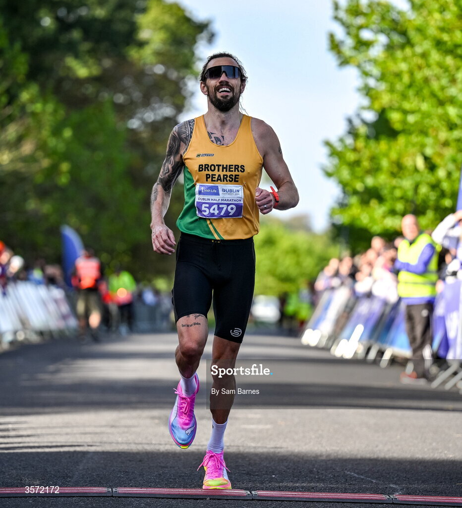 20 September 2026; James Folan from Dublin crosses the line to finish second in the 2026 Irish Life Dublin Half Marathon, which took place on Sunday 20th September in Phoenix Park, marking the final event of the 2026 Irish Life Dublin Race Series. Photo by Sam Barnes/Sportsfile
