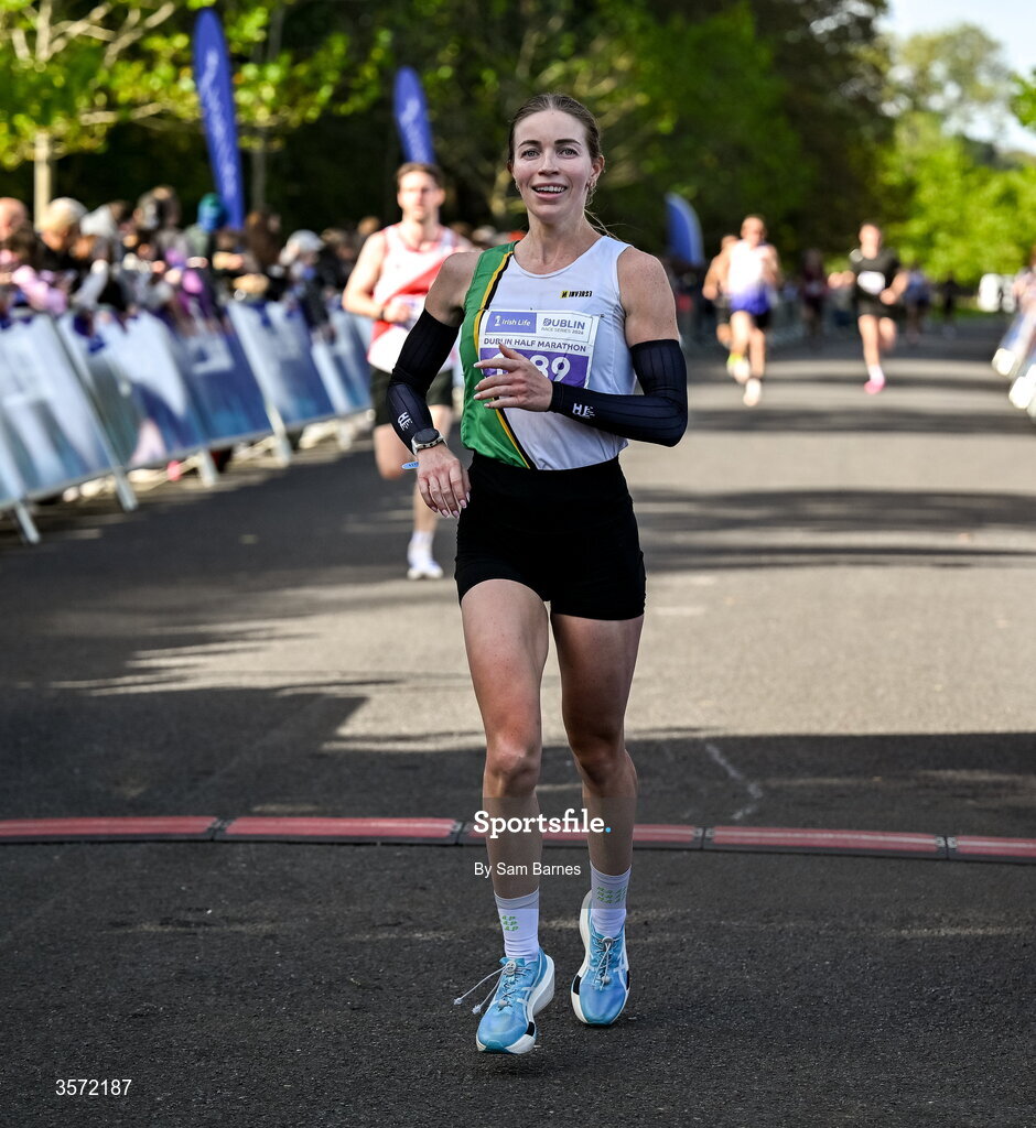 20 September 2026; Sarah Diamond from Wicklow crosses the line as third place female finisher during the 2026 Irish Life Dublin Half Marathon, which took place on Sunday 20th September in Phoenix Park, marking the final event of the 2026 Irish Life Dublin Race Series. Photo by Sam Barnes/Sportsfile