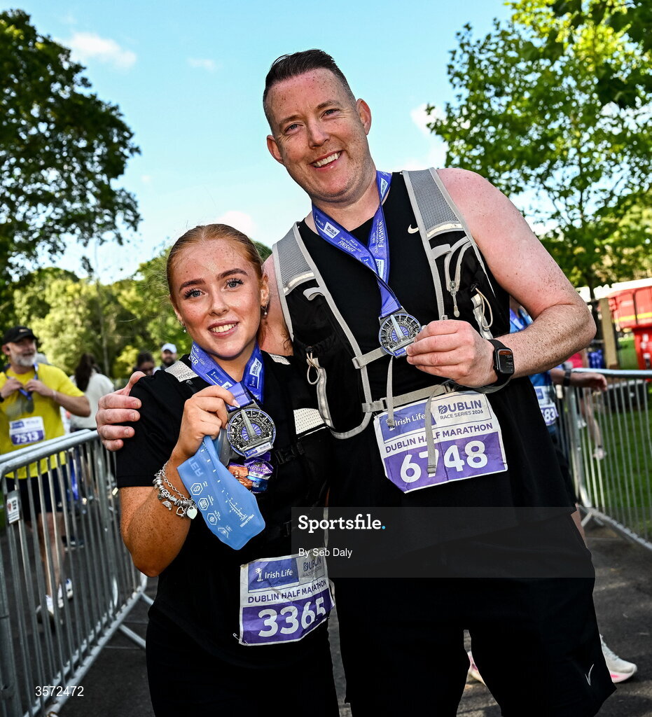 20 September 2026; Niamh Kelly from Dublin, left, and Paul Higgins from Dublin pictured during the 2026 Irish Life Dublin Half Marathon, which took place on Sunday 20th September in Phoenix Park, marking the final event of the 2026 Irish Life Dublin Race Series. Photo by Seb Daly/Sportsfile