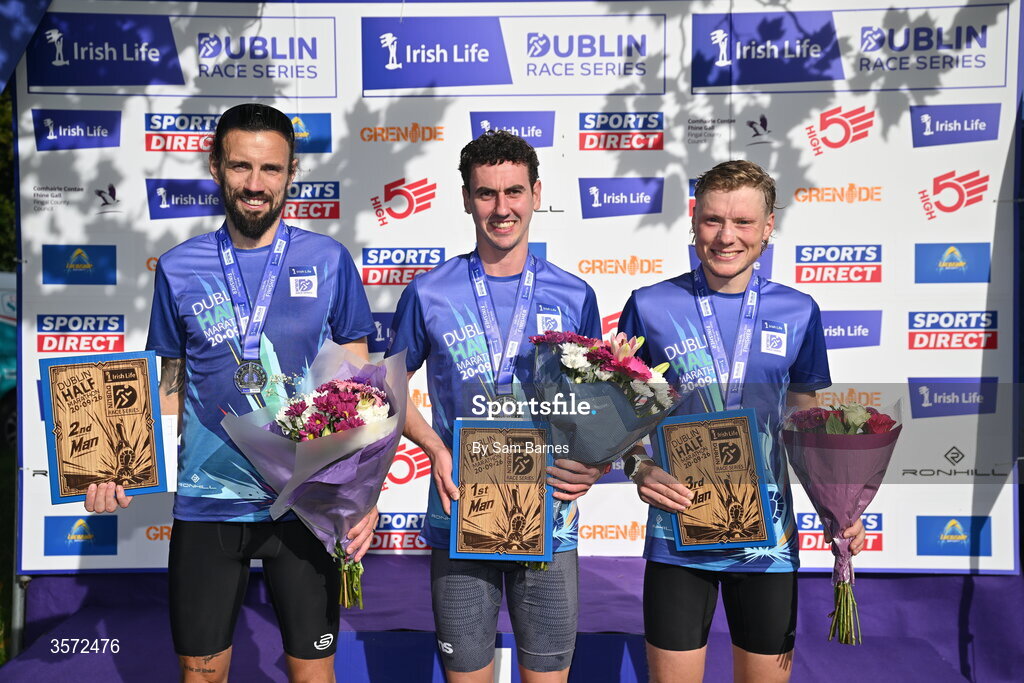 20 September 2026; Men's top 3 finishers, from left, second place Eddie O'Connor of brothers Pearse AC, winner James Hyland, Raheny Shamrocks, and third place Matthew Mc Connell from Wicklow pictured after the 2026 Irish Life Dublin Half Marathon, which took place on Sunday 20th September in Phoenix Park, marking the final event of the 2026 Irish Life Dublin Race Series