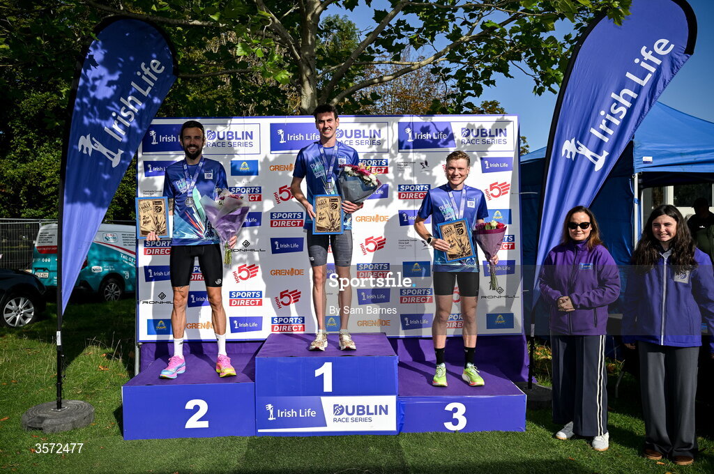 20 September 2026; Barbara O’Malley, Chief People Officer, Irish Life, right, with Men's top 3 finishers, from left, second place Eddie O'Connor of brothers Pearse AC, winner James Hyland, Raheny Shamrocks, and third place Matthew Mc Connell from Wicklow pictured after the 2026 Irish Life Dublin Half Marathon, which took place on Sunday 20th September in Phoenix Park, marking the final event of the 2026 Irish Life Dublin Race Series. Photo by Sam Barnes/Sportsfile