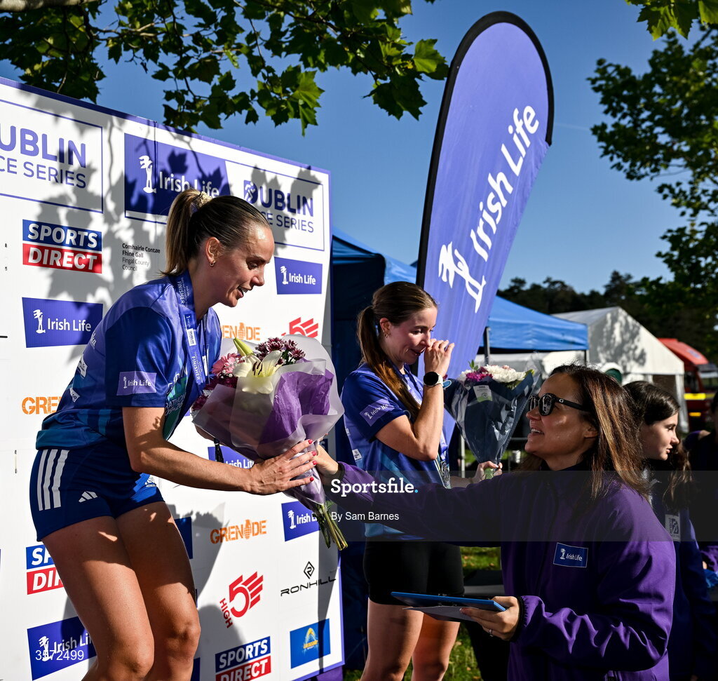 20 September 2026; Barbara O’Malley, Chief People Officer, Irish Life, presents to Women's winner Meghan Ryan from Dublin after the 2026 Irish Life Dublin Half Marathon, which took place on Sunday 20th September in Phoenix Park, marking the final event of the 2026 Irish Life Dublin Race Series. Photo by Sam Barnes/Sportsfile