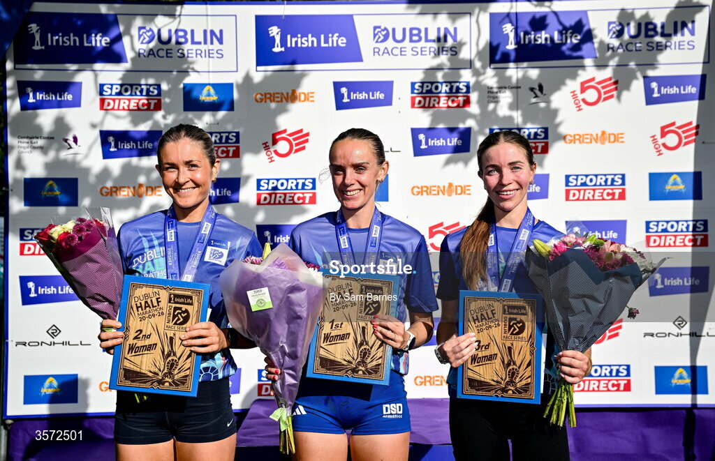 20 September 2026; Women's top 3 finishers, from left, second place Ruby Wall from Dublin, winner Meghan Ryan from Dublin, and third place Sarah Diamond from Wicklow after the 2026 Irish Life Dublin Half Marathon, which took place on Sunday 20th September in Phoenix Park, marking the final event of the 2026 Irish Life Dublin Race Series. Photo by Sam Barnes/Sportsfile