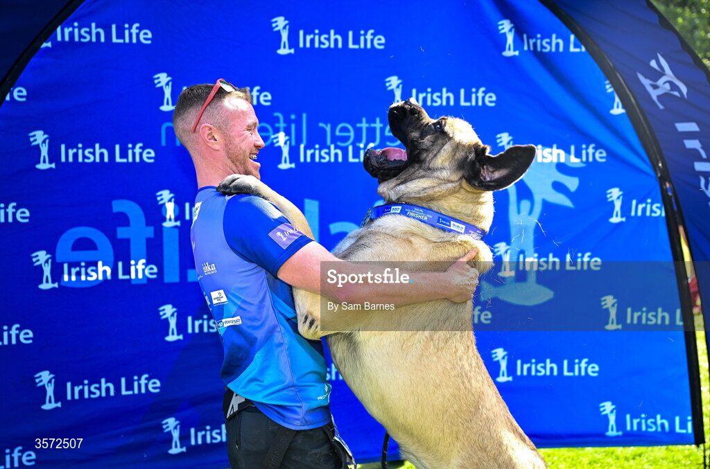 20 September 2026; Ciaran Creighton from Dublin celebrates with his dog Elvis after the 2026 Irish Life Dublin Half Marathon, which took place on Sunday 20th September in Phoenix Park, marking the final event of the 2026 Irish Life Dublin Race Series. Photo by Sam Barnes/Sportsfile
