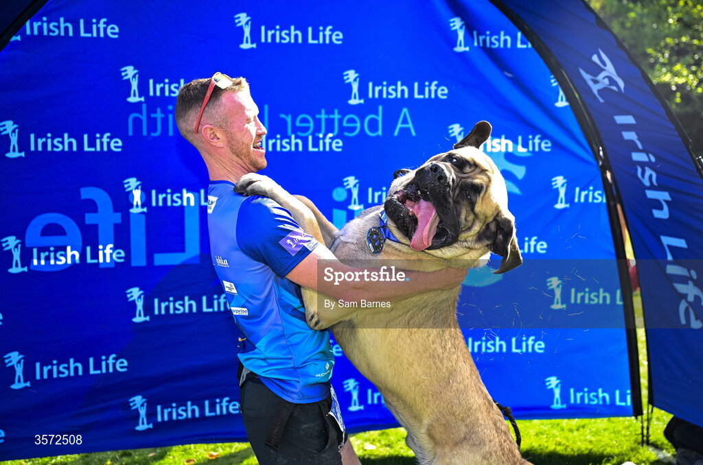 20 September 2026; Ciaran Creighton from Dublin celebrates with his dog Elvis after the 2026 Irish Life Dublin Half Marathon, which took place on Sunday 20th September in Phoenix Park, marking the final event of the 2026 Irish Life Dublin Race Series. Photo by Sam Barnes/Sportsfile