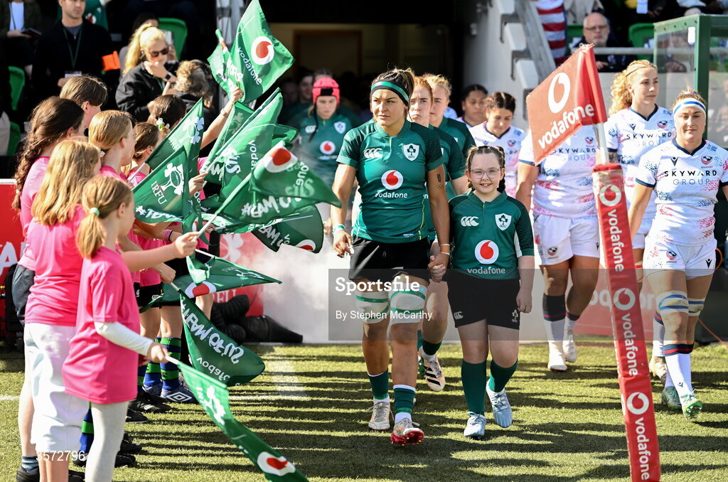 20 September 2026; Ireland captain Erin King walks out with mascot Aimee-Katie Nolan Dunne for the WXV Global Series match between Ireland and USA at Tallaght Stadium in Dublin. Photo by Stephen McCarthy/Sportsfile