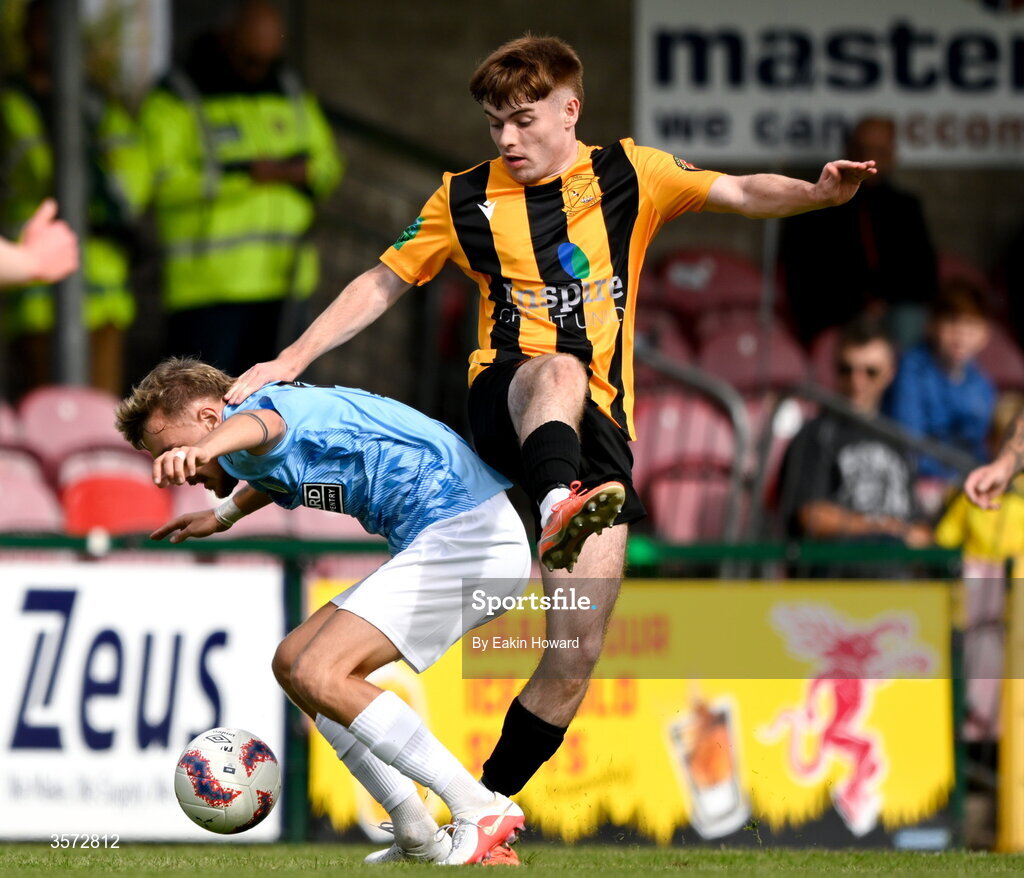 20 September 2026; Jakub Gaup of St Mary's AFC in action against Evan Cummins of Cobh Wanderers during the 2026 FAI Intermediate Cup Final between Cobh Wanderers and St Mary's at Munster FA Turners Cross Stadium in Cork. Photo by Eakin Howard/Sportsfile