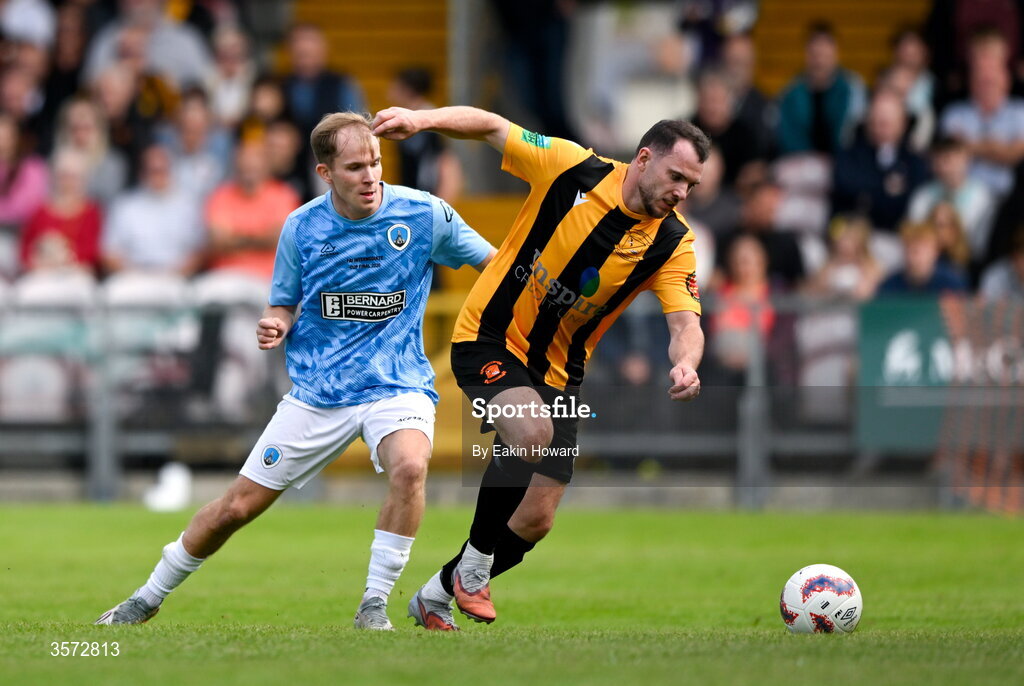 20 September 2026; George Keating of Cobh Wanderers in action against Fionn Kelly of St Mary's AFC during the 2026 FAI Intermediate Cup Final between Cobh Wanderers and St Mary's at Munster FA Turners Cross Stadium in Cork. Photo by Eakin Howard/Sportsfile