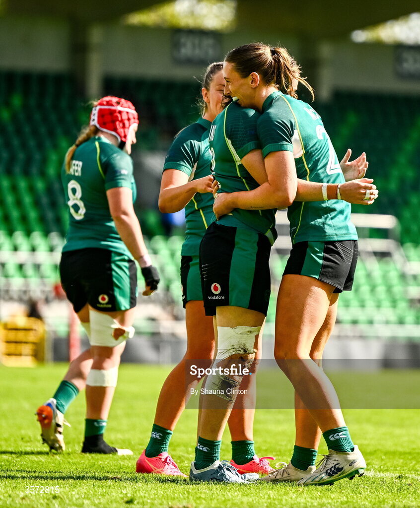 20 September 2026; Eve Higgins of Ireland, left, is congratulated by team-mate Anna McGann after scoring her side's fourth try despite the efforts of Erica Coulibaly of USA during the WXV Global Series match between Ireland and USA at Tallaght Stadium in Dublin. Photo by Shauna Clinton/Sportsfile