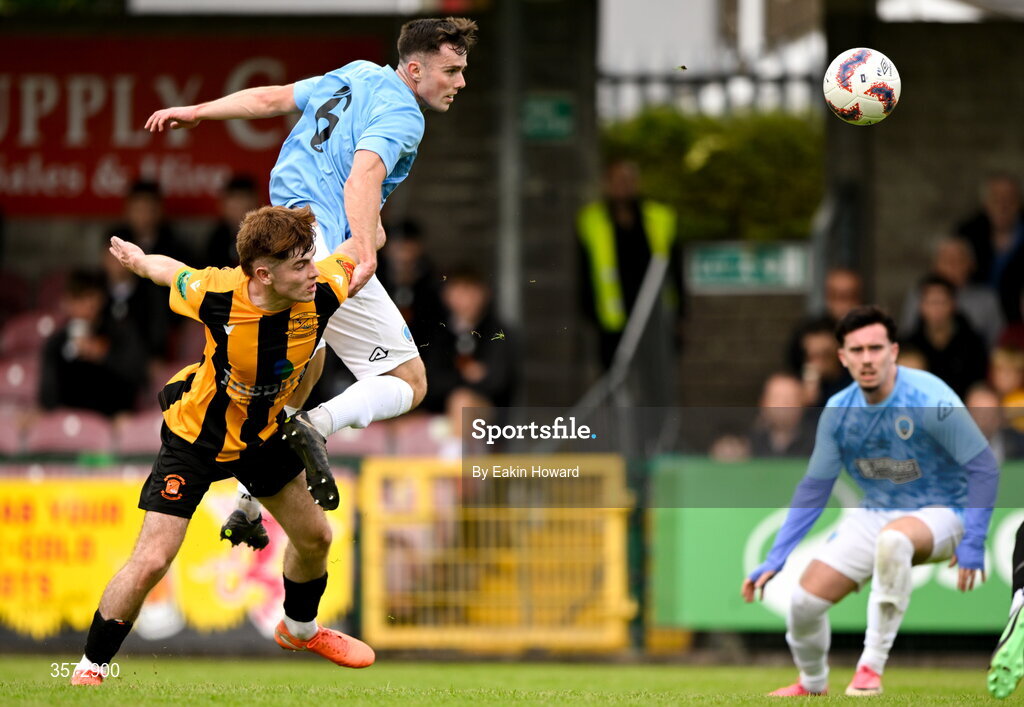 20 September 2026; Evan Cummins of Cobh Wanderers in action against Neil Cunningham of St Mary's AFC during the 2026 FAI Intermediate Cup Final between Cobh Wanderers and St Mary's at Munster FA Turners Cross Stadium in Cork. Photo by Eakin Howard/Sportsfile