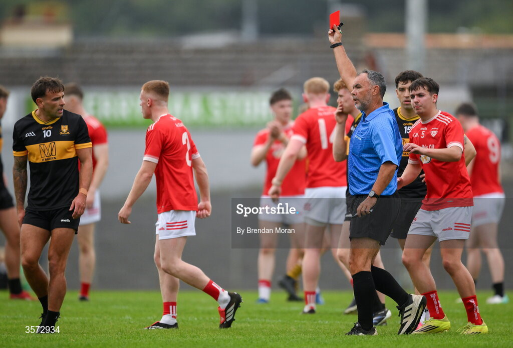 20 September 2026; Referee Paul Hayes shows a red card to Micheal Burns of Dr Crokes, 10, during the Kerry Senior Club Football Championship Final between Dr Crokes and Rathmore at Fitzgerald Stadium in Killarney, Kerry. Photo by Brendan Moran/Sportsfile