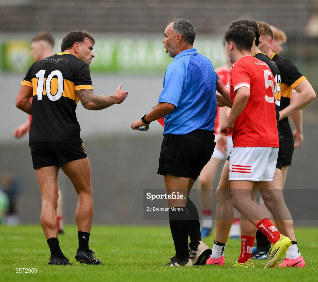 20 September 2026; Micheal Burns of Dr Crokes speaks to referee Paul Hayes after being shown a red card during the Kerry Senior Club Football Championship Final between Dr Crokes and Rathmore at Fitzgerald Stadium in Killarney, Kerry. Photo by Brendan Moran/Sportsfile