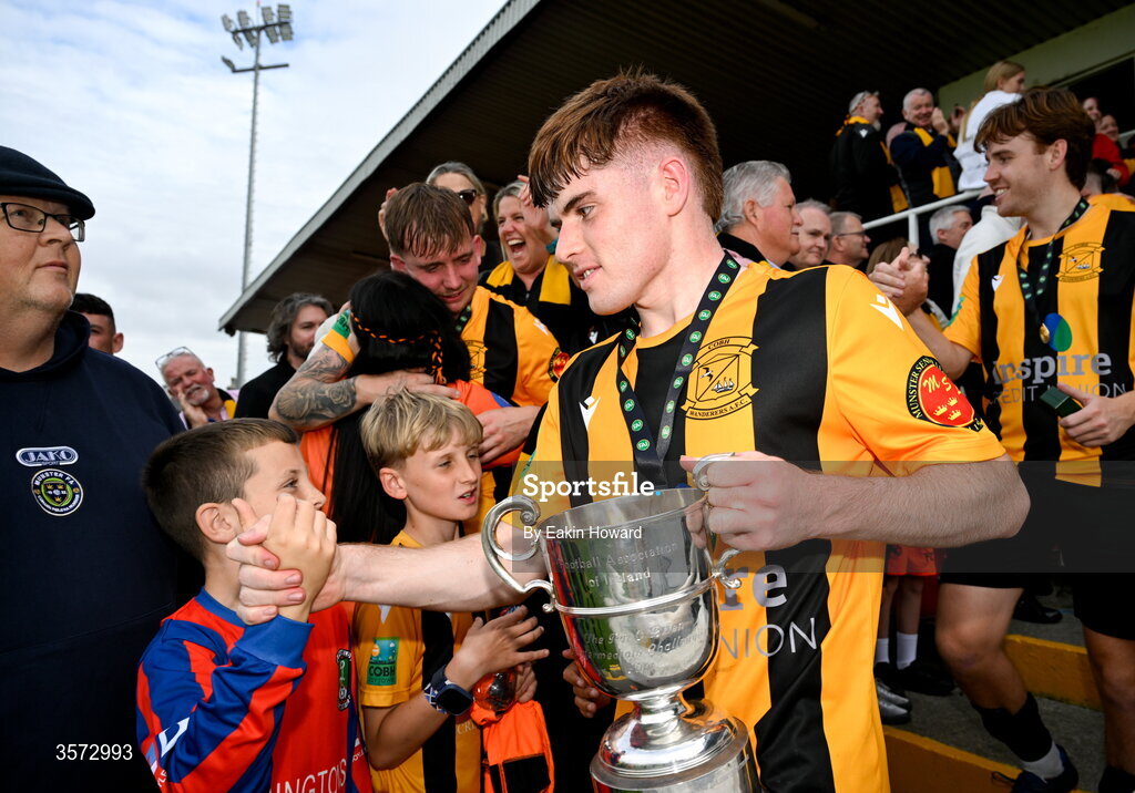 20 September 2026; Evan Cummins of Cobh Wanderers celebrates with fans after the 2026 FAI Intermediate Cup Final between Cobh Wanderers and St Mary's at Munster FA Turners Cross Stadium in Cork. Photo by Eakin Howard/Sportsfile