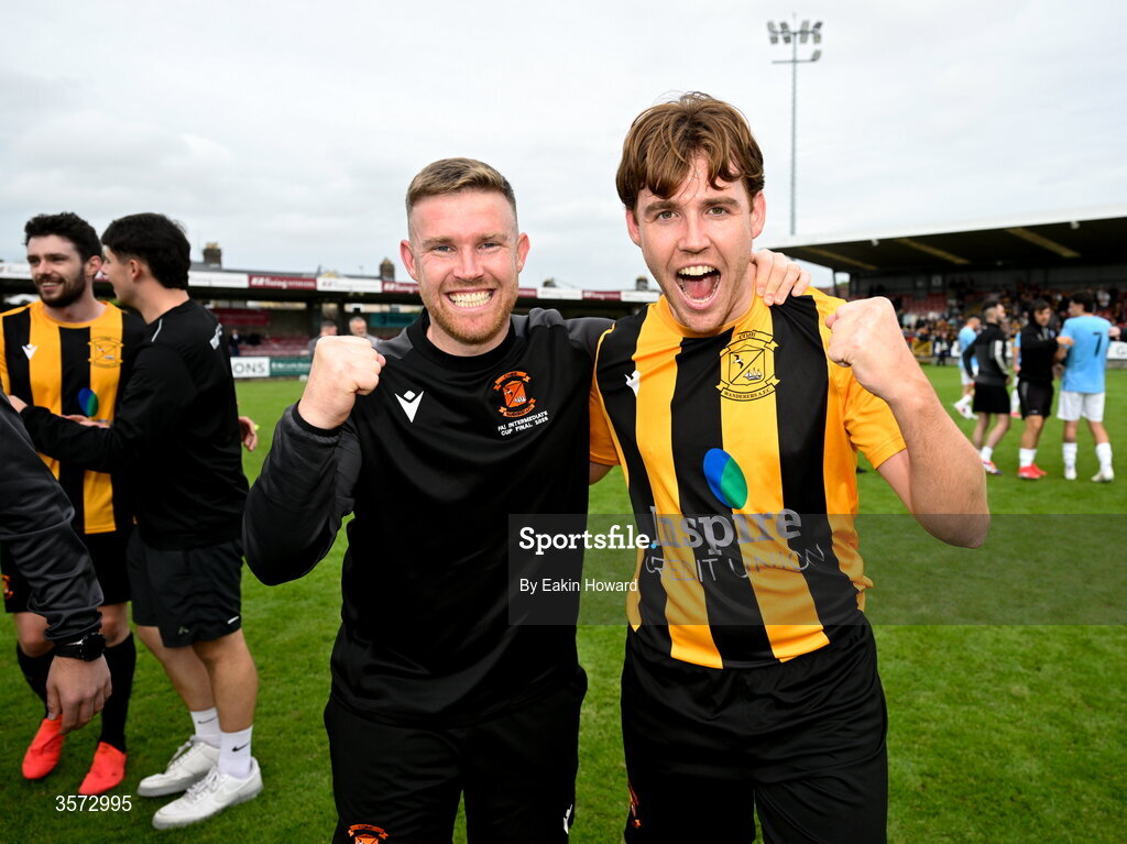 20 September 2026; Cobh Wanderers manager Jason Abbott and Niall Abbott celebrate after the 2026 FAI Intermediate Cup Final between Cobh Wanderers and St Mary's at Munster FA Turners Cross Stadium in Cork. Photo by Eakin Howard/Sportsfile