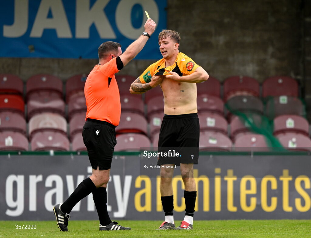 120 September 2026; Referee Robert O'Leary issues a yellow card to Ciaran Griffin of Cobh Wanderers after his goal during the 2026 FAI Intermediate Cup Final between Cobh Wanderers and St Mary's at Munster FA Turners Cross Stadium in Cork. Photo by Eakin Howard/Sportsfile
