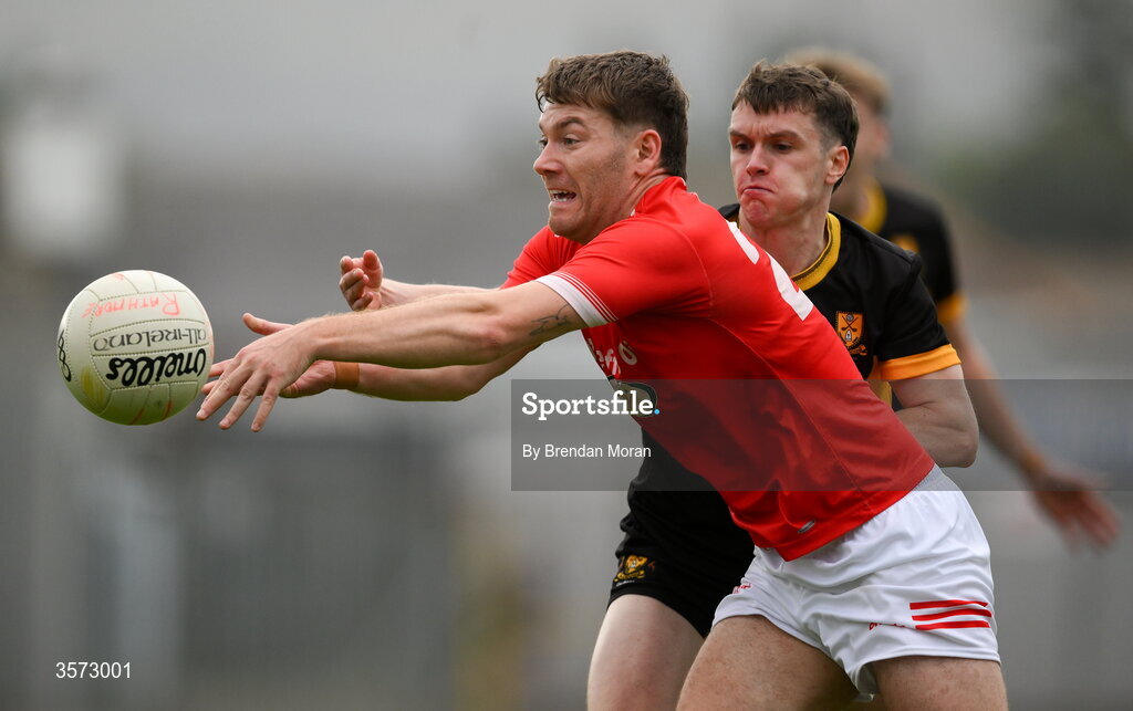 20 September 2026; Brian Friel of Rathmore is tackled by Mark Fitzgerald of Dr Crokes during the Kerry Senior Club Football Championship Final between Dr Crokes and Rathmore at Fitzgerald Stadium in Killarney, Kerry. Photo by Brendan Moran/Sportsfile