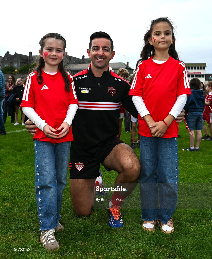 20 September 2026; Rathmore manager Aidan O'Mahony with his daughters Lisa and Lucia after the Kerry Senior Club Football Championship Final between Dr Crokes and Rathmore at Fitzgerald Stadium in Killarney, Kerry. Photo by Brendan Moran/Sportsfile