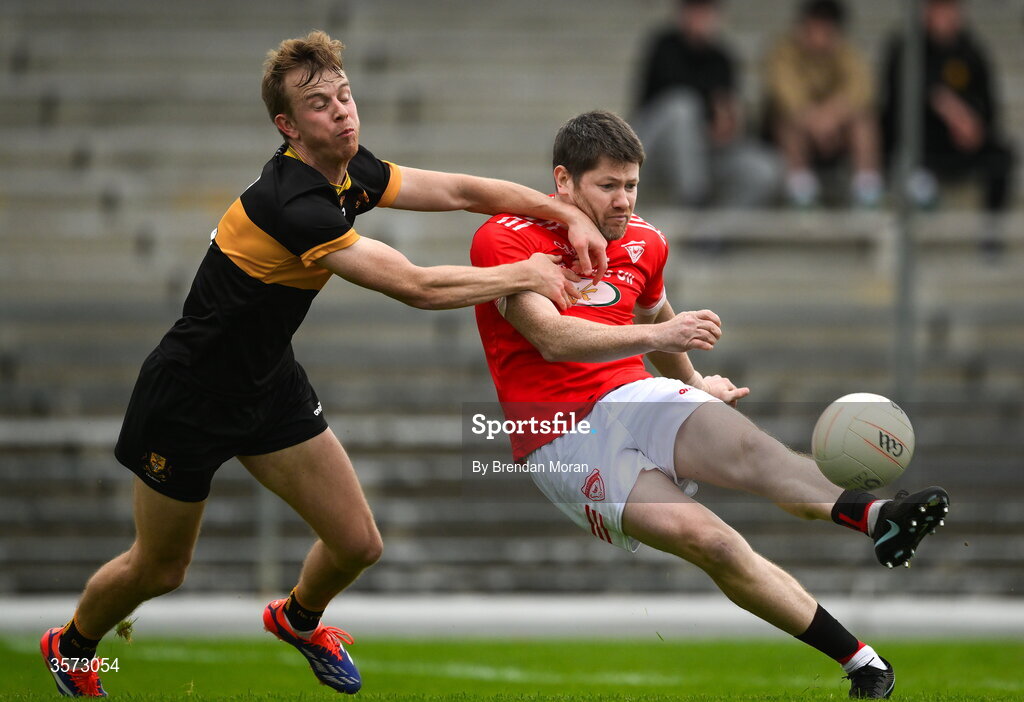 20 September 2026; John Moynihan of Rathmore is tackled by Fionn Fitzgerald of Dr Crokes during the Kerry Senior Club Football Championship Final between Dr Crokes and Rathmore at Fitzgerald Stadium in Killarney, Kerry. Photo by Brendan Moran/Sportsfile