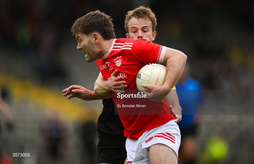 20 September 2026; Brian Friel of Rathmore is tackled by Fionn Fitzgerald of Dr Crokes during the Kerry Senior Club Football Championship Final between Dr Crokes and Rathmore at Fitzgerald Stadium in Killarney, Kerry. Photo by Brendan Moran/Sportsfile