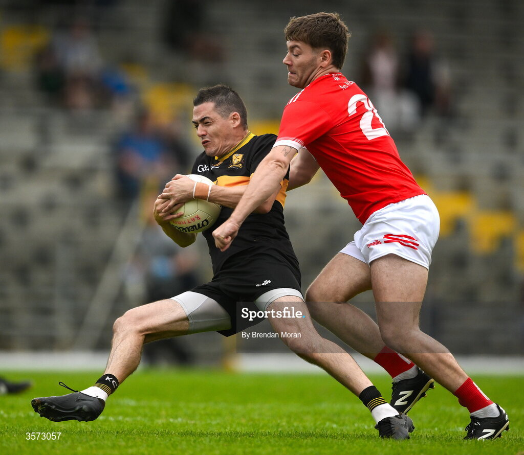 20 September 2026; Brian Looney of Dr Crokes is tackled by Brian Friel of Rathmore during the Kerry Senior Club Football Championship Final between Dr Crokes and Rathmore at Fitzgerald Stadium in Killarney, Kerry. Photo by Brendan Moran/Sportsfile