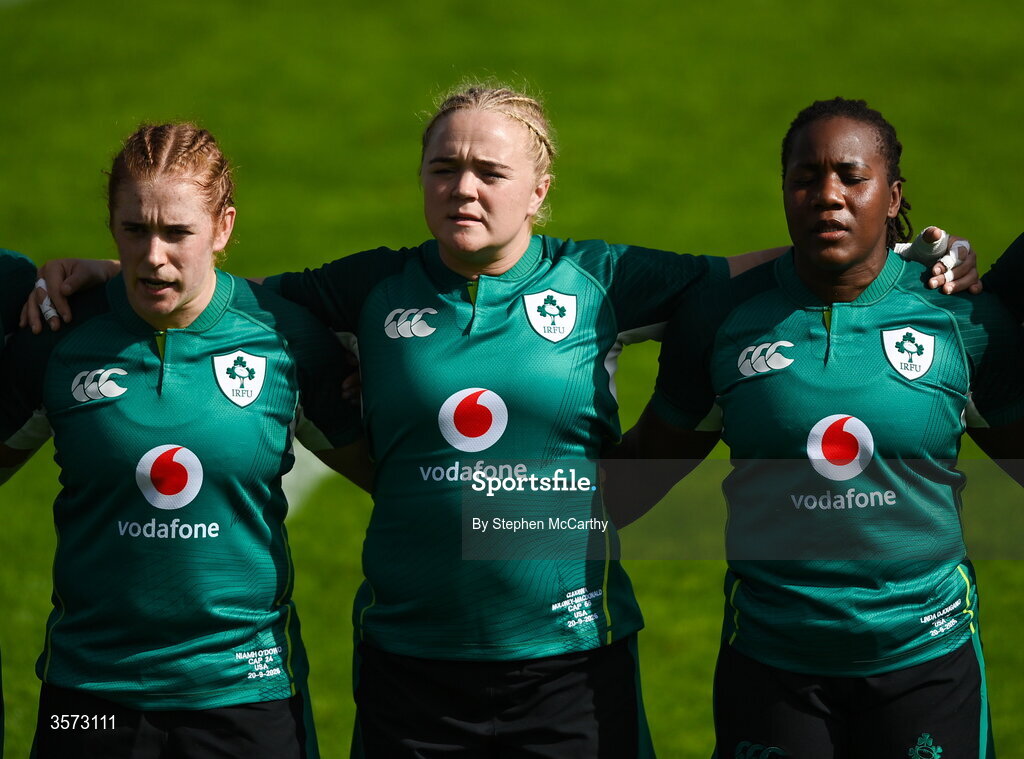 20 September 2026; Ireland players, from left, Niamh O'Dowd, Cliodhna Moloney-MacDonald and Linda Djougang stand for the playing of the National Anthem before the WXV Global Series match between Ireland and USA at Tallaght Stadium in Dublin. Photo by Stephen McCarthy/Sportsfile