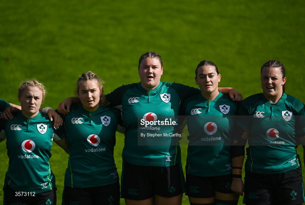 20 September 2026; Ireland players, from left, Neve Jones, Sadhbh McGrath, Eilís Cahill, Jane Clohessy and Brittany Hogan stand for the playing of the National Anthem before the WXV Global Series match between Ireland and USA at Tallaght Stadium in Dublin. Photo by Stephen McCarthy/Sportsfile
