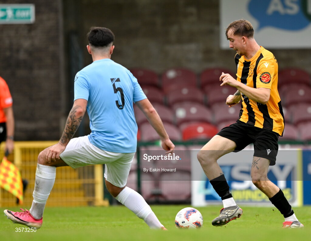20 September 2026; Ciaran Griffin of Cobh Wanderers in action against Dan Ryan Fortune of St Mary's AFC during the 2026 FAI Intermediate Cup Final between Cobh Wanderers and St Mary's at Munster FA Turners Cross Stadium in Cork. Photo by Eakin Howard/Sportsfile