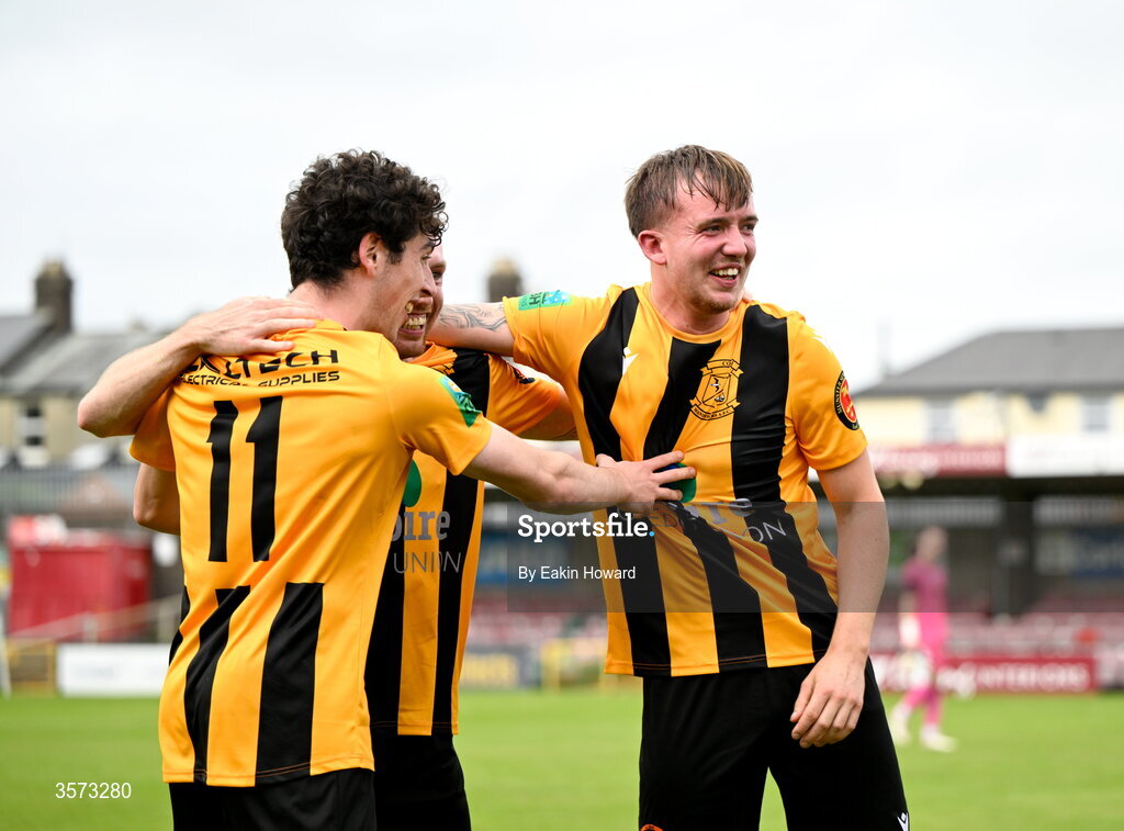 20 September 2026; Ciaran Griffin of Cobh Wanderers celebrates with team-mates Adam O Sullivan and Oisín Dorgan after winning the 2026 FAI Intermediate Cup Final between Cobh Wanderers and St Mary's at Munster FA Turners Cross Stadium in Cork. Photo by Eakin Howard/Sportsfile