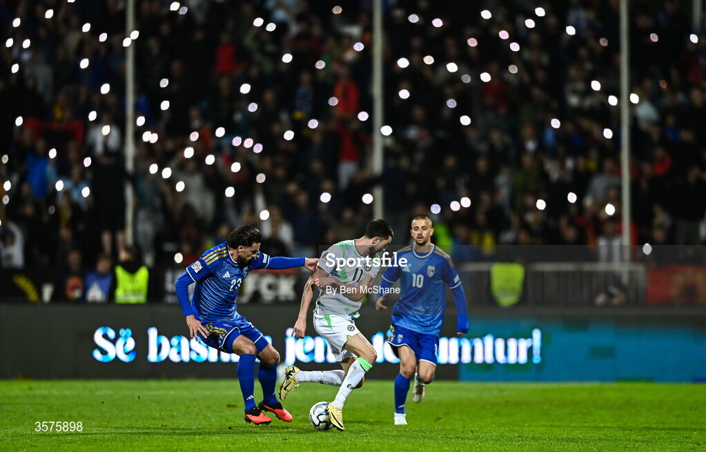 24 September 2026; Finn Azaz of Republic of Ireland in action against Leon Avdullahu, left, and Edon Zhegrova of Kosovo during the UEFA Nations League B match between Kosovo and Republic of Ireland at Fadil Vokrri Stadium in Pristina, Kosovo. Photo by Ben McShane/Sportsfile