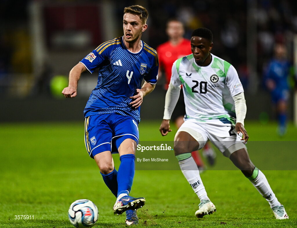 24 September 2026; Illir Krasniqi of Kosovo in action against Chiedozie Ogbene of Republic of Ireland during the UEFA Nations League B match between Kosovo and Republic of Ireland at Fadil Vokrri Stadium in Pristina, Kosovo. Photo by Ben McShane/Sportsfile