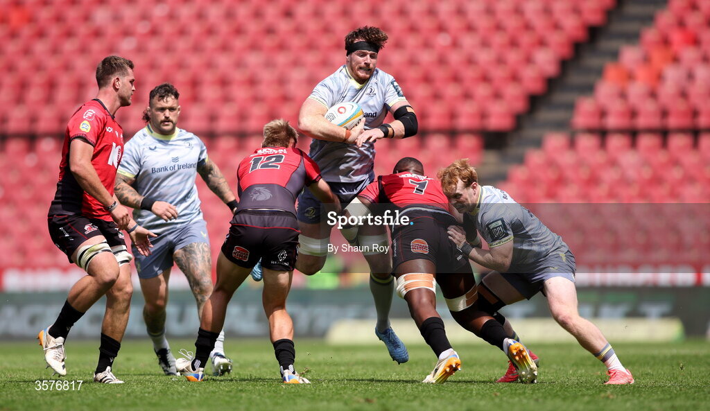 26 September 2026; Ryan Baird of Leinster in action against Richard Kriel, left, and Batho Hlekani of 10bet Lions during the United Rugby Championship match between Lions and Leinster at Ellis Park in Johannesburg, South Africa. Photo by Shaun Roy/Sportsfile