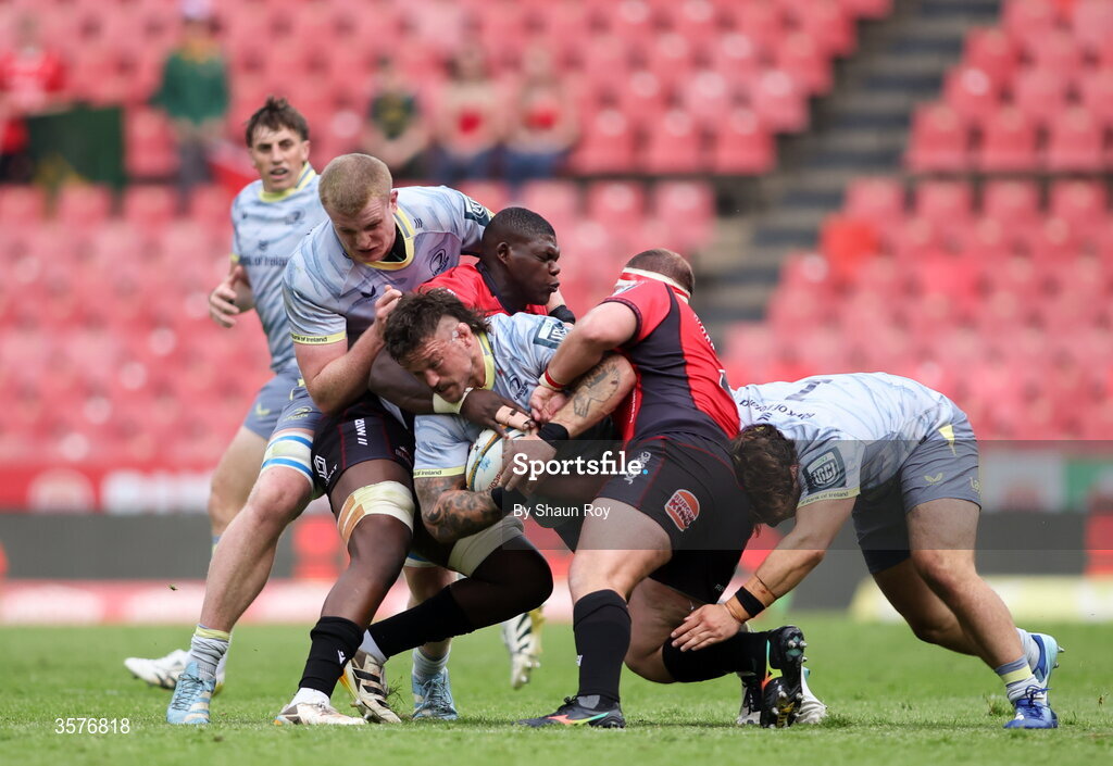 26 September 2026; Andrew Porter of Leinster is tackled by Batho Hlekani of 10bet Lions, left, during the United Rugby Championship match between Lions and Leinster at Ellis Park in Johannesburg, South Africa. Photo by Shaun Roy/Sportsfile