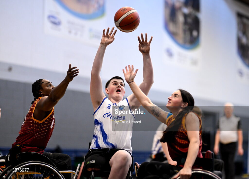 26 September 2026; Michael Dennedy of Clonaslee WBC in action against Elaine O'Halloran of Titans BC and Xtremea Ewean during the Basketball Ireland National Cup quarter-final between Titans BC and Clonaslee WBC in the Irish Wheelchair Association Sports Hall in Clontarf, Dublin. Photo by Eakin Howard/Sportsfile