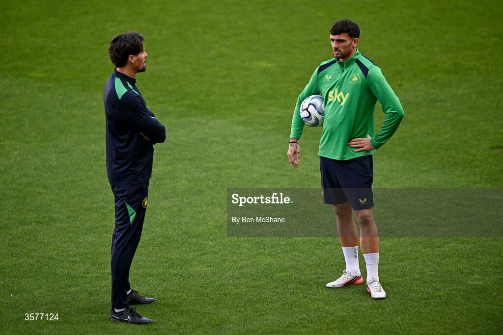 26 September 2026; Assistant coach Paddy McCarthy, left, and Troy Parrott during the Republic of Ireland training session at Nagyerdei Stadion in Debrecen, Hungary. Photo by Ben McShane/Sportsfile
