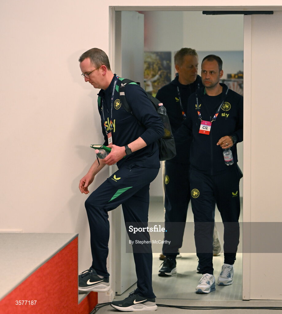 26 September 2026; FAI chief executive David Courell, left, head coach Heimir Hallgrimsson, and FAI director of football John Martin, right, arrive for the Republic of Ireland press conference at Nagyerdei Stadion in Debrecen, Hungary. Photo by Stephen McCarthy/Sportsfile