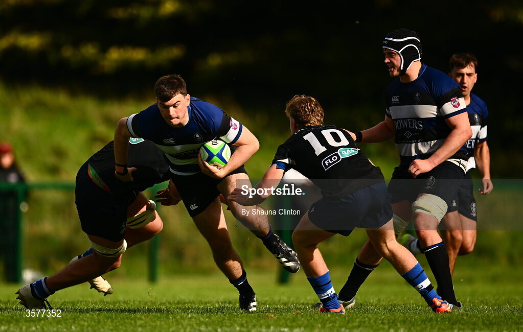 26 September 2026; James Kenny of Wanderers is tackled by Billy Cross of Galway Corinthians during the Energia Men's All-Ireland League Division 2A match between Galway Corinthians and Wanderers at Dangan Sportground in Galway. Photo by Shauna Clinton/Sportsfile