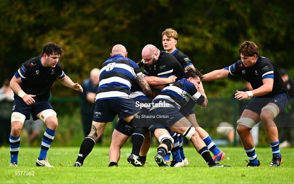 26 September 2026; Ray Dufficy of Galway Corinthians is tackled by Padraig Dundon of Wanderers during the Energia Men's All-Ireland League Division 2A match between Galway Corinthians and Wanderers at Dangan Sportground in Galway. Photo by Shauna Clinton/Sportsfile