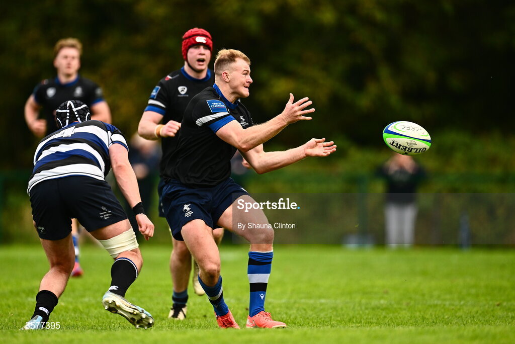 26 September 2026; Colm De Buitléar of Galway Corinthians is tackled by Mark O'Reilly of Wanderers during the Energia Men's All-Ireland League Division 2A match between Galway Corinthians and Wanderers at Dangan Sportground in Galway. Photo by Shauna Clinton/Sportsfile