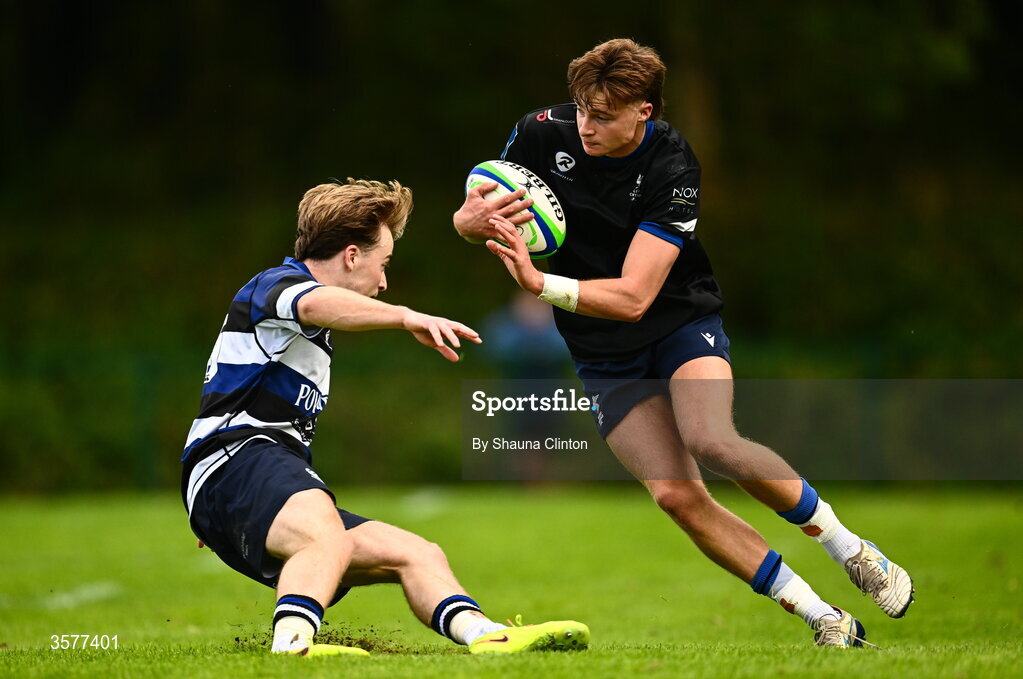 26 September 2026; Aiden Vetjens of Galway Corinthians is tackled by Sean Sexton of Wanderers during the Energia Men's All-Ireland League Division 2A match between Galway Corinthians and Wanderers at Dangan Sportground in Galway. Photo by Shauna Clinton/Sportsfile