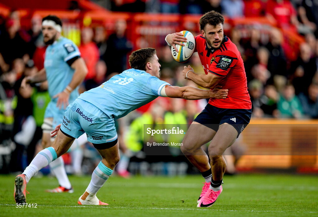 26 September 2026; Alex Nankivell of Munster is tackled by Dan Lancaster of Glasgow Warriors during the United Rugby Championship match between Munster and Glasgow Warriors at Thomond Park in Limerick. Photo by Brendan Moran/Sportsfile