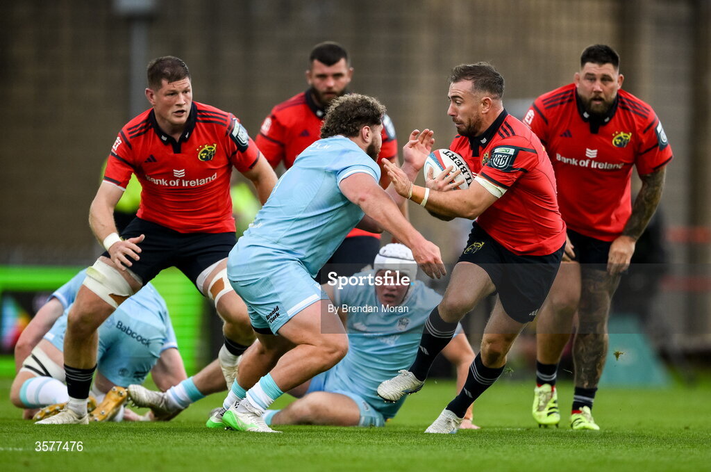 26 September 2026; JJ Hanrahan of Munster is tackled by Patrick Schickerling of Glasgow Warriors during the United Rugby Championship match between Munster and Glasgow Warriors at Thomond Park in Limerick. Photo by Brendan Moran/Sportsfile