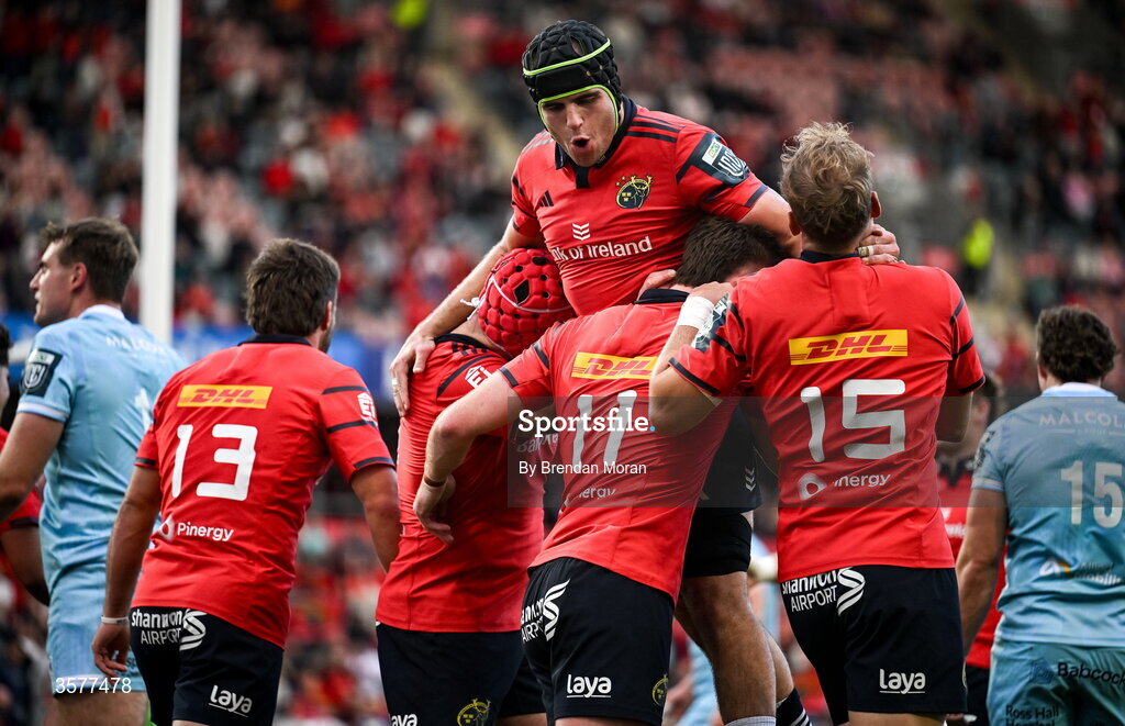26 September 2026; Alex Kendellen of Munster, top. celebrates with teamates and try scorer, Ben O’Connor, 11, after heir side's first try during the United Rugby Championship match between Munster and Glasgow Warriors at Thomond Park in Limerick. Photo by Brendan Moran/Sportsfile