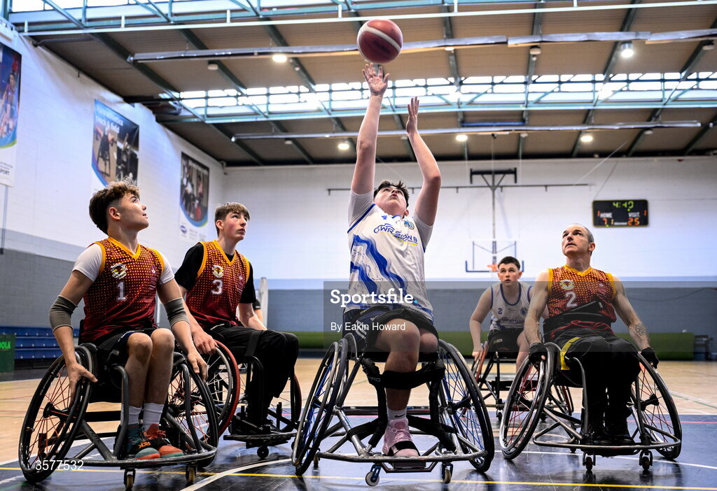 26 September 2026; Conor Dufficy of Clonaslee WBC in action against Ethan Leonard of Titans BC, John Blake, and Liam O'Boyle during the Basketball Ireland National Cup quarter-final between Titans BC and Clonaslee WBC in the Irish Wheelchair Association Sports Hall in Clontarf, Dublin. Photo by Eakin Howard/Sportsfile