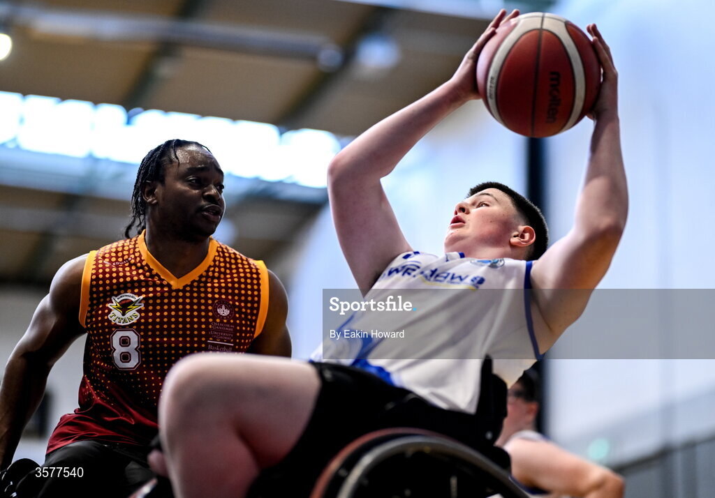 26 September 2026; Michael Dennedy of Clonaslee WBC in action against Xtremea Ewean of Titans BC during the Basketball Ireland National Cup quarter-final between Titans BC and Clonaslee WBC in the Irish Wheelchair Association Sports Hall in Clontarf, Dublin. Photo by Eakin Howard/Sportsfile