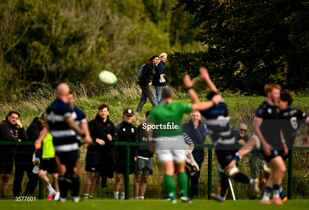 26 September 2026; Passer-by look on a during the Energia Men's All-Ireland League Division 2A match between Galway Corinthians and Wanderers at Dangan Sportground in Galway. Photo by Shauna Clinton/Sportsfile