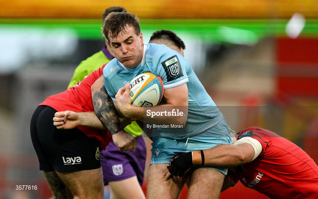26 September 2026; Stafford McDowall of Glasgow Warriors is tackled by Kieran Brookes and Fineen Wycherley of Munster during the United Rugby Championship match between Munster and Glasgow Warriors at Thomond Park in Limerick. Photo by Brendan Moran/Sportsfile