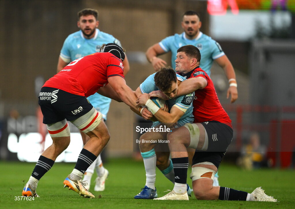 26 September 2026; Jamie Dobie of Glasgow Warriors is tackled by Jack O’Donoghue and Jack O’Donoghue of Munster during the United Rugby Championship match between Munster and Glasgow Warriors at Thomond Park in Limerick. Photo by Brendan Moran/Sportsfile