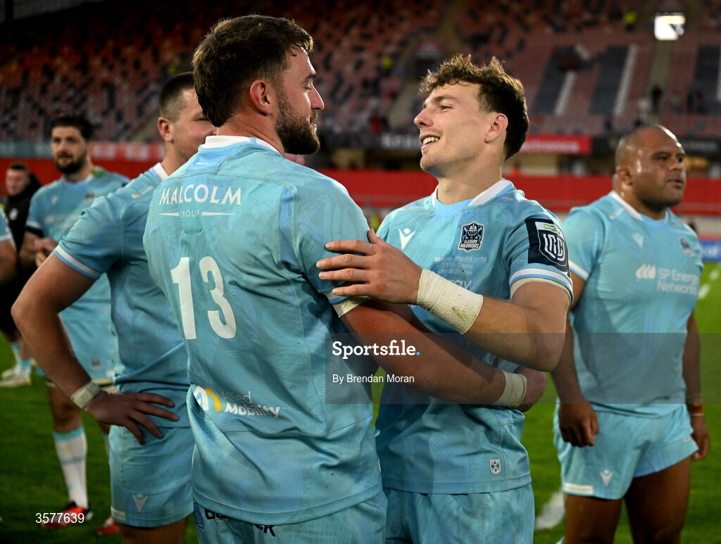 26 September 2026; Jamie Dobie, right, and teammate Ollie Smith of Glasgow Warriors celebrate after the United Rugby Championship match between Munster and Glasgow Warriors at Thomond Park in Limerick. Photo by Brendan Moran/Sportsfile