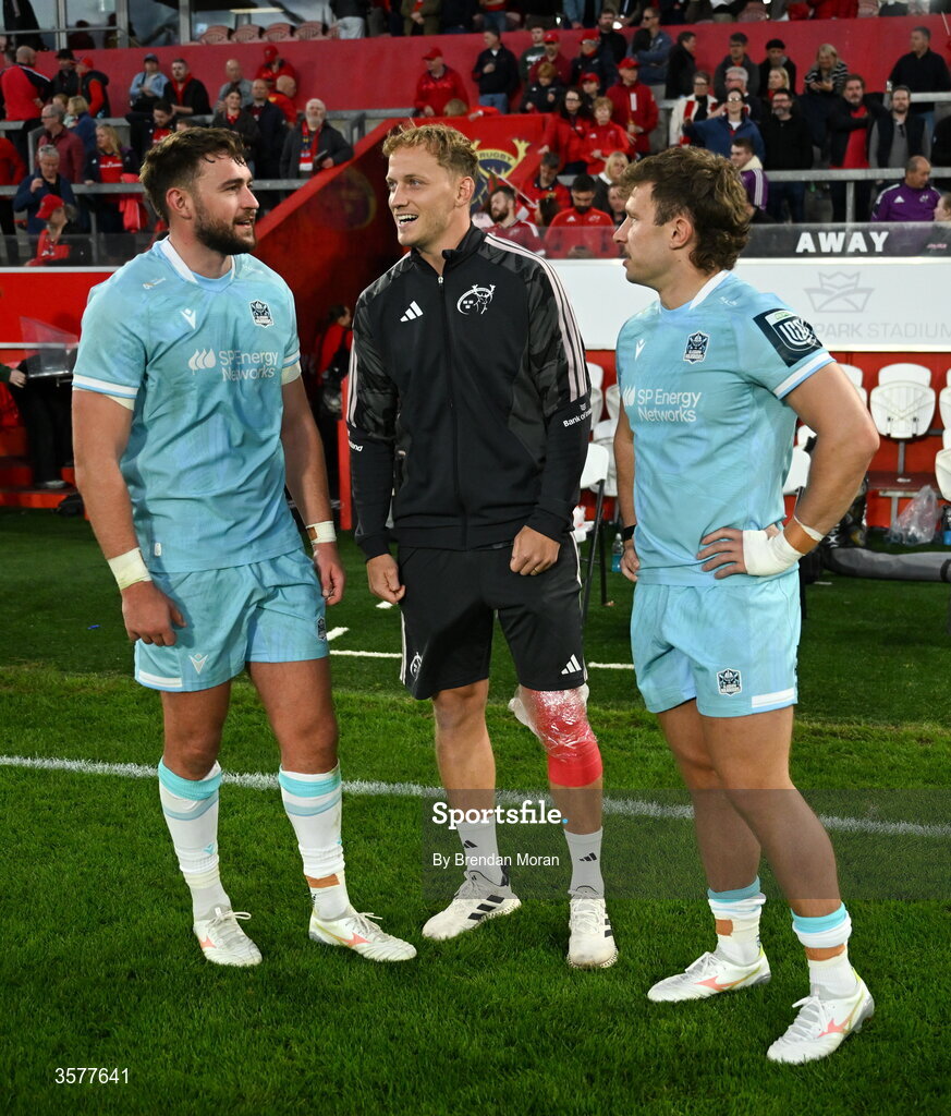 26 September 2026; Mike Haley of Munster, centre, in conversation with Ollie Smith, left, and Kyle Rowe of Glasgow Warriors after the United Rugby Championship match between Munster and Glasgow Warriors at Thomond Park in Limerick. Photo by Brendan Moran/Sportsfile