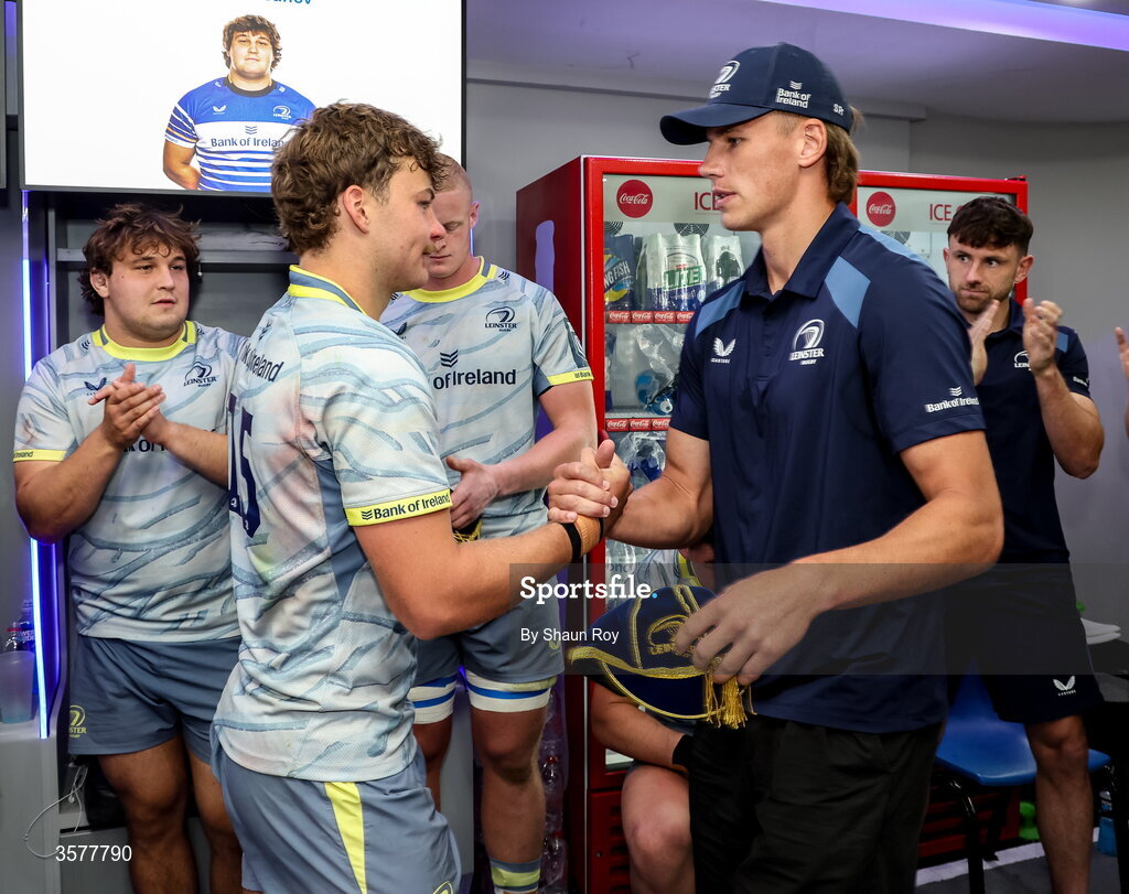 26 September 2026; Leinster debutant Todd Lawlor is presented with his first cap by teammate Sam Prendergast after the United Rugby Championship match between Lions and Leinster at Ellis Park in Johannesburg, South Africa. Photo by Shaun Roy/Sportsfile